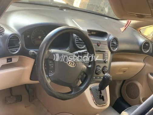 كيا كارينز 2012 أسود مستعملة للبيع - 9