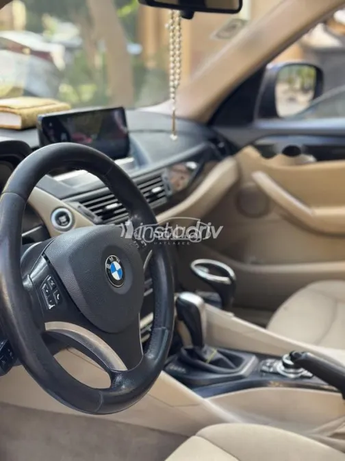 بي ام دبليو X1 2012 أحمر غامق مستعملة للبيع - 8