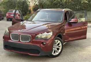 بي ام دبليو X1 2012 أحمر غامق مستعملة للبيع