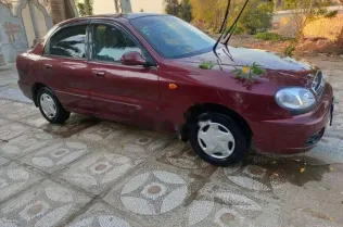 شيفروليه لانوس 2016 أحمر غامق مستعملة للبيع