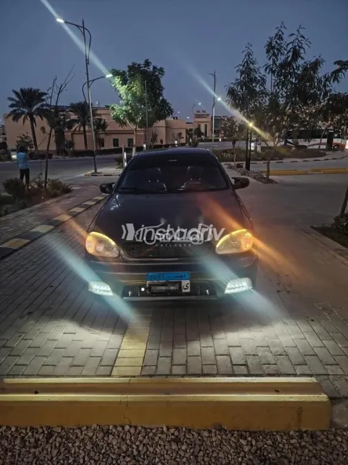 دايو لانوس 2 2003 رمادي مستعملة للبيع - 8