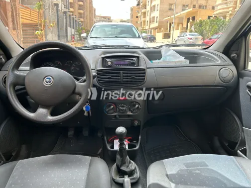 فيات بونتو 2009 أبيض مستعملة للبيع - 7