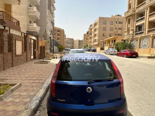 فيات بونتو 2009 أبيض مستعملة للبيع - 9