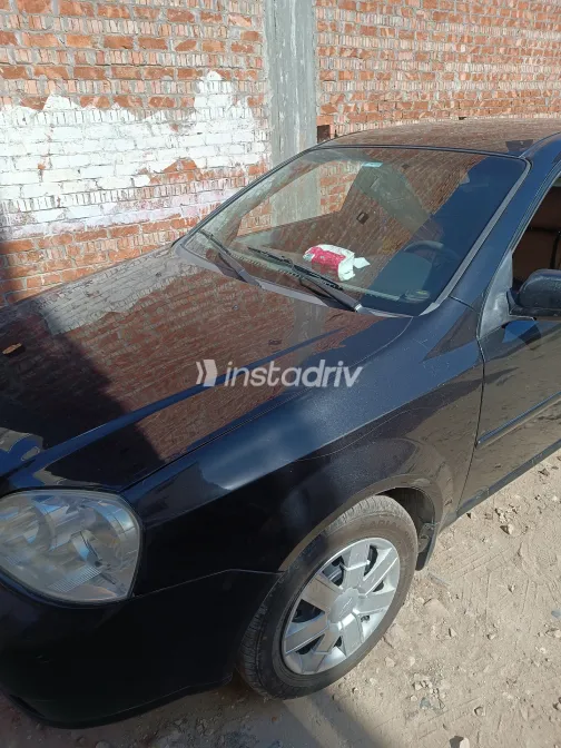 شيفروليه أوبترا 2013 أبيض مستعملة للبيع - 2