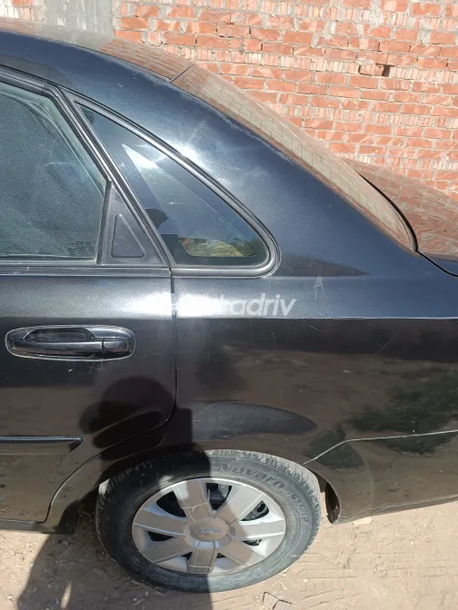 شيفروليه أوبترا 2013 أبيض مستعملة للبيع - 4