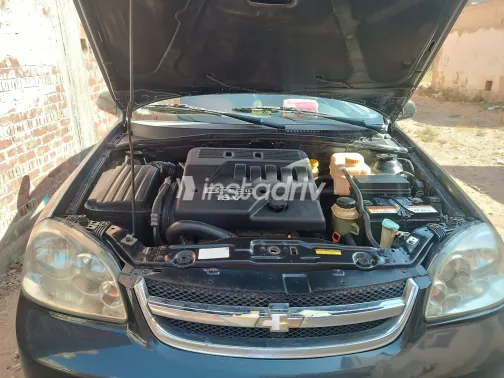 شيفروليه أوبترا 2013 أبيض مستعملة للبيع - 5