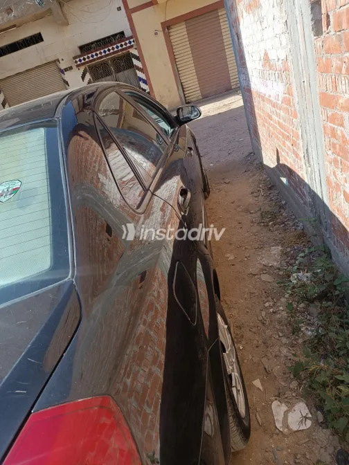 شيفروليه أوبترا 2013 أبيض مستعملة للبيع - 6