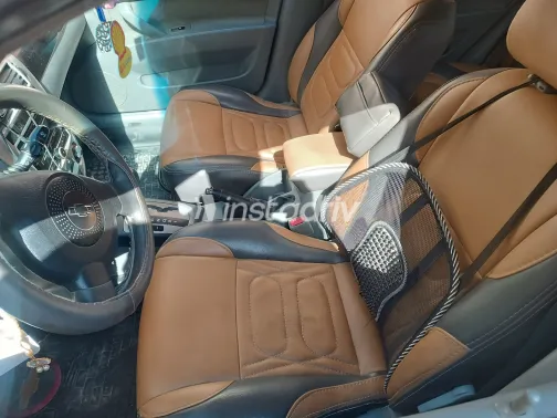 شيفروليه أوبترا 2013 أبيض مستعملة للبيع - 8