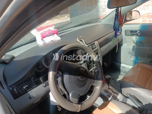 شيفروليه أوبترا 2013 أبيض مستعملة للبيع - 10