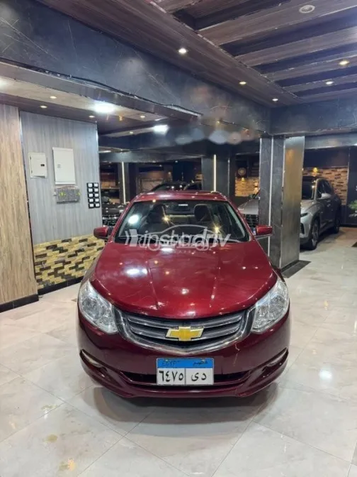 شيفروليه أوبترا 2016 أحمر غامق مستعملة للبيع - 1