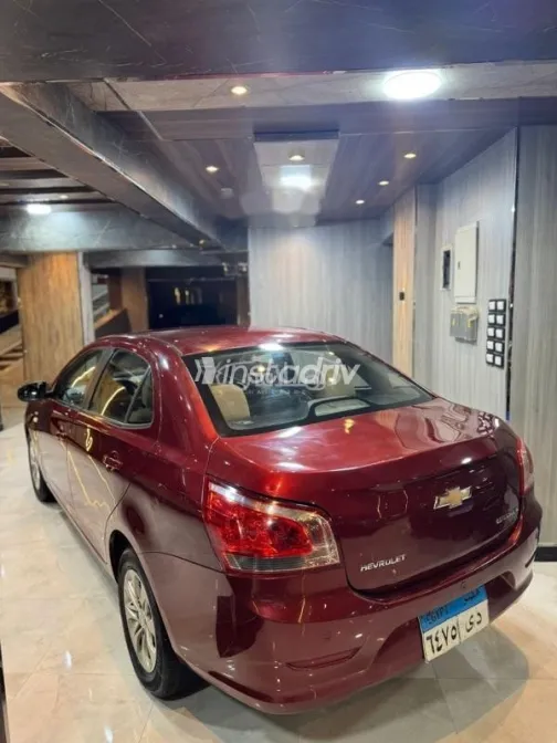 شيفروليه أوبترا 2016 أحمر غامق مستعملة للبيع - 4