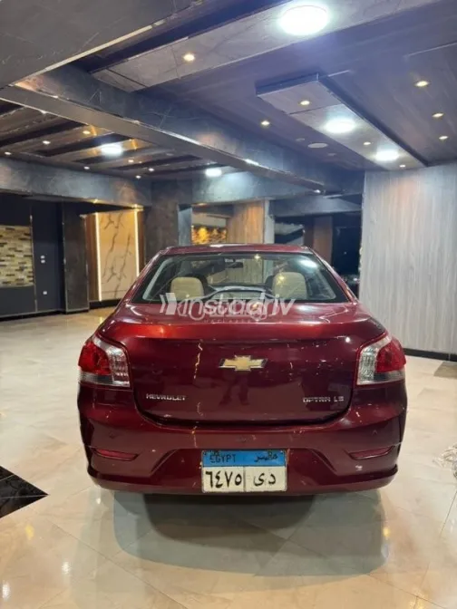 شيفروليه أوبترا 2016 أحمر غامق مستعملة للبيع - 5