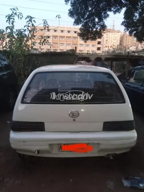 دايهاتسو شاريد 1993 أبيض مستعملة للبيع - 2