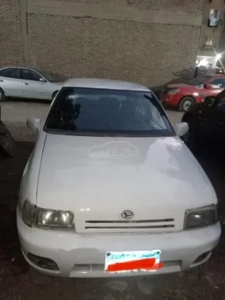 دايهاتسو شاريد 1993 أبيض مستعملة للبيع