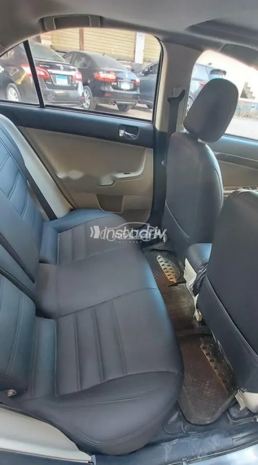 ميتسوبيشي لانسر اى اكس شارك 2016 رمادي غامق مستعملة للبيع - 4