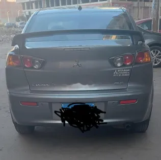 ميتسوبيشي لانسر اى اكس شارك 2016 رمادي غامق مستعملة للبيع