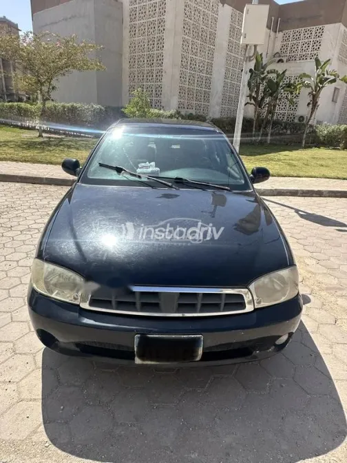 كيا سبكترا 2004 أسود مستعملة للبيع - 1