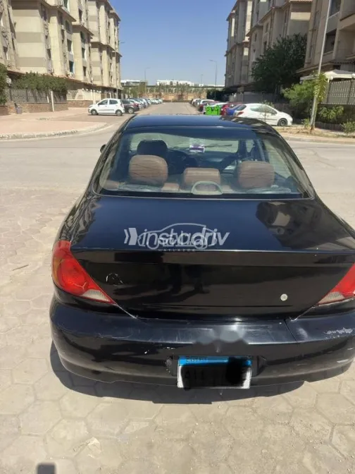 كيا سبكترا 2004 أسود مستعملة للبيع - 4