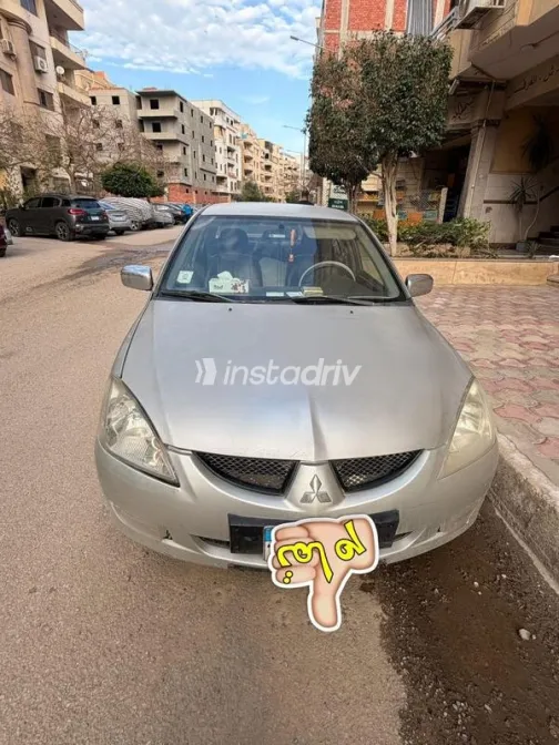 ميتسوبيشي لانسر 2006 فضي مستعملة للبيع - 1