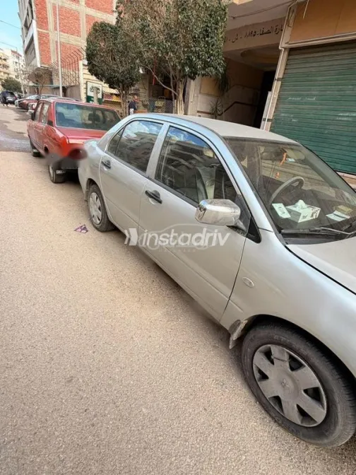 ميتسوبيشي لانسر 2006 فضي مستعملة للبيع - 2