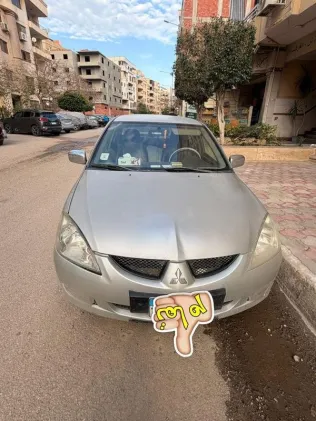 ميتسوبيشي لانسر 2006 فضي مستعملة للبيع