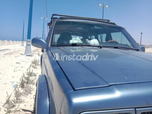 جيب شيروكي 1998 رمادي غامق مستعملة للبيع - 2