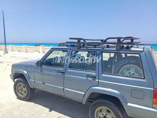 جيب شيروكي 1998 رمادي غامق مستعملة للبيع - 3