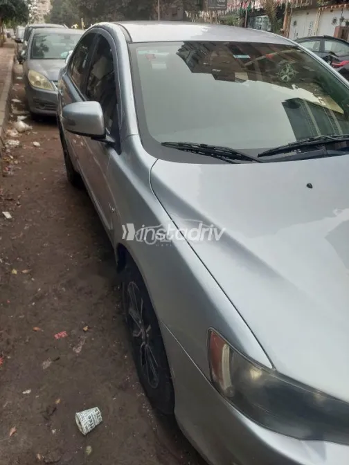 ميتسوبيشي لانسر 2016 فضي مستعملة للبيع - 4