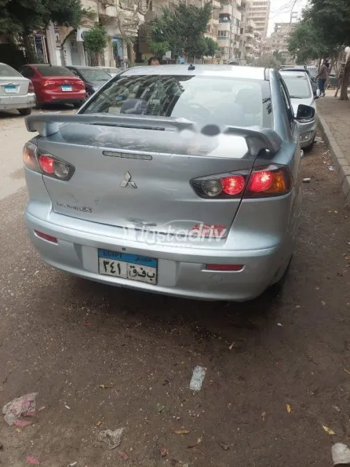ميتسوبيشي لانسر 2016 فضي مستعملة للبيع - 6