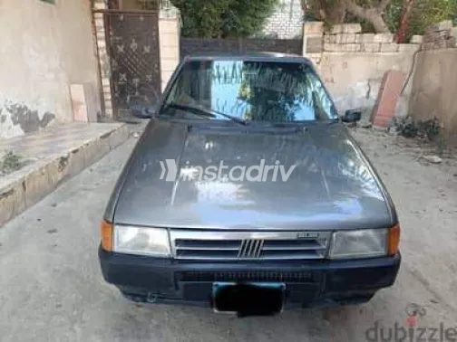 فيات اونو 1994 أبيض مستعملة للبيع - 2