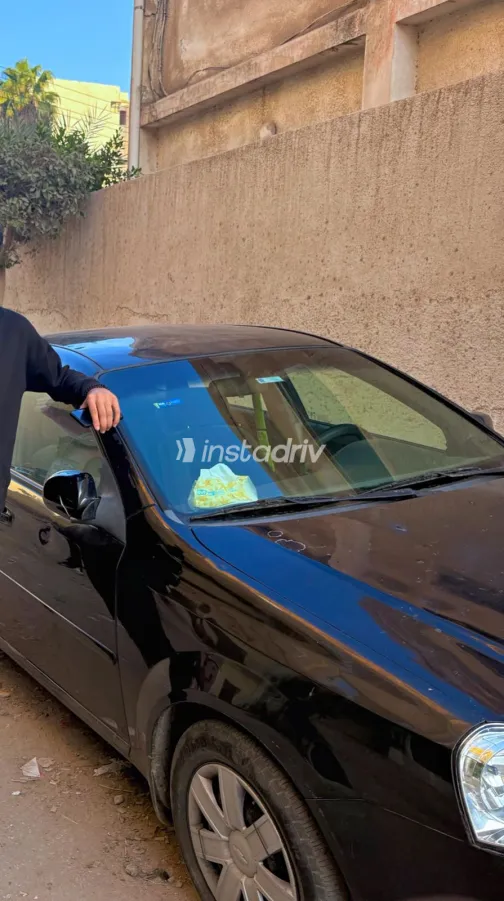 Chevrolet Optra 2012 White Used for Sale - 1