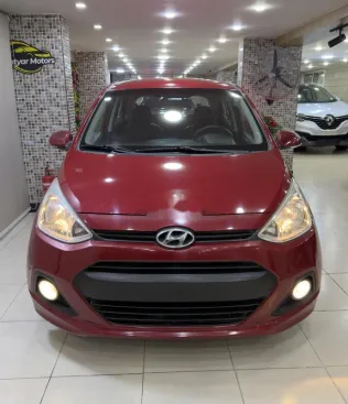 هيونداي جراند i10 2015 أحمر غامق مستعملة للبيع