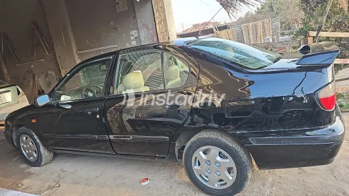 نيسان صنى 1998 أبيض مستعملة للبيع - 3