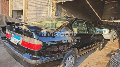 نيسان صنى 1998 أبيض مستعملة للبيع - 4