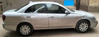 نيسان صنى 2006 فضي مستعملة للبيع