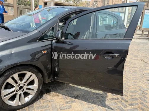 اوبل كورسا 2013 أبيض مستعملة للبيع - 10