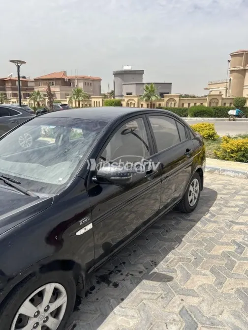 هيونداي اكسنت 2010 أسود مستعملة للبيع - 4