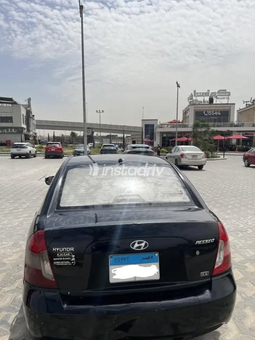 هيونداي اكسنت 2010 أسود مستعملة للبيع - 6