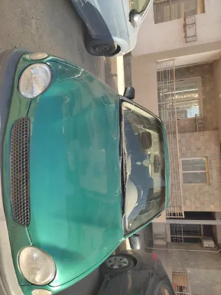 تويوتا كورولا 1999 أبيض مستعملة للبيع