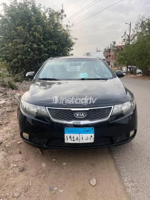كيا سيراتو 2010 أسود مستعملة للبيع - 1