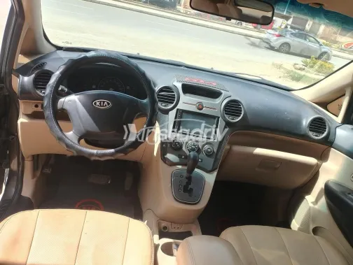 كيا كارينز 2010 بني مستعملة للبيع - 1