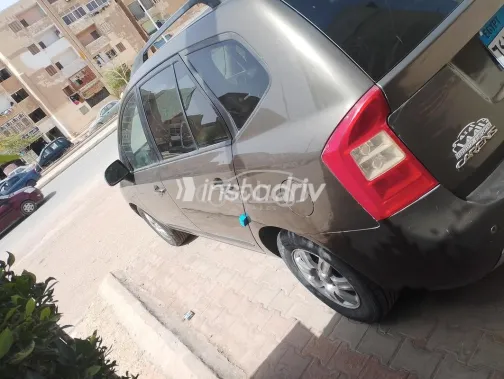 كيا كارينز 2010 بني مستعملة للبيع - 5