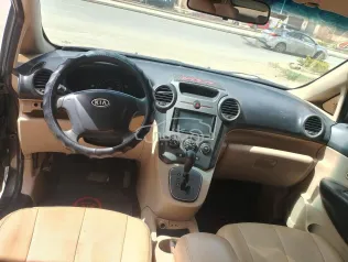 كيا كارينز 2010 بني مستعملة للبيع
