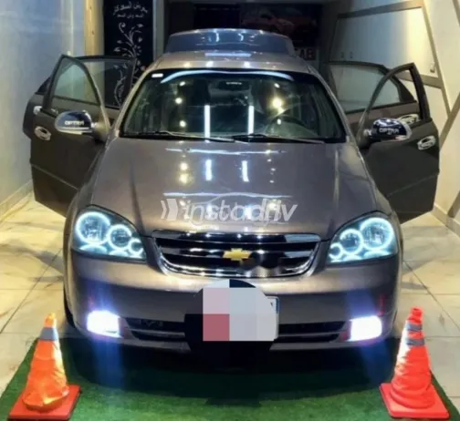 شيفروليه أوبترا 2013 رمادي غامق مستعملة للبيع - 3