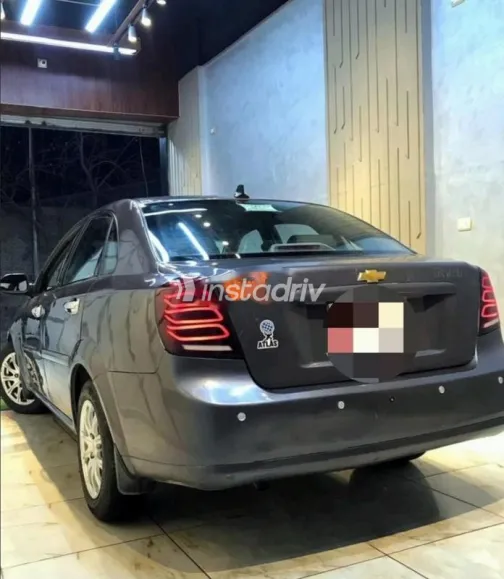 شيفروليه أوبترا 2013 رمادي غامق مستعملة للبيع - 6