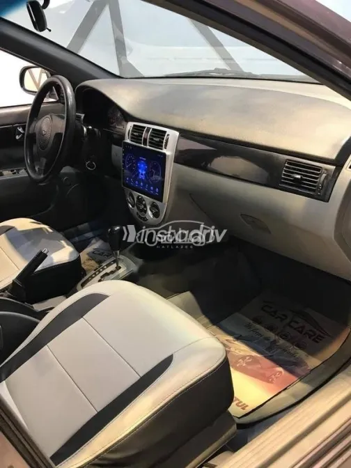 شيفروليه أوبترا 2013 رمادي غامق مستعملة للبيع - 9