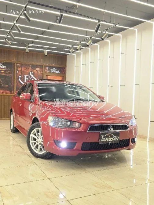 ميتسوبيشي لانسر 2015 أحمر غامق مستعملة للبيع - 2