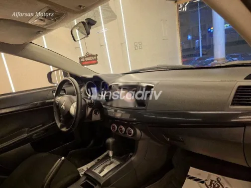 ميتسوبيشي لانسر 2015 أحمر غامق مستعملة للبيع - 6