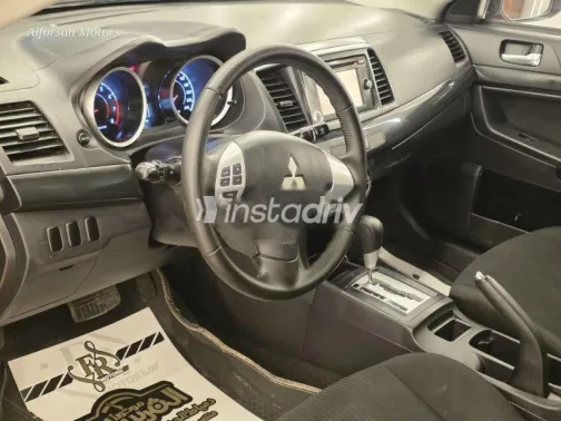 ميتسوبيشي لانسر 2015 أحمر غامق مستعملة للبيع - 7