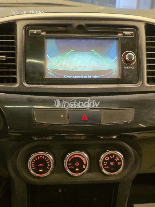 ميتسوبيشي لانسر 2015 أحمر غامق مستعملة للبيع - 9